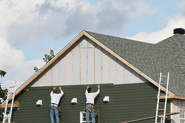 Professional Emergency Siding Repair technician working in Freeport, FL